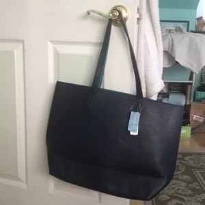 Faux leather reversible tote bag